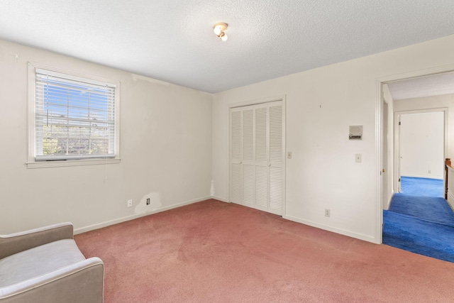 191 Green Harbor Rd, Old Hickory, TN 37138 - unfurnished bedroom featuring carpet flooring, a closet, and a textured ceiling