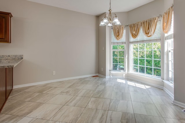 5409 Oak Chase Dr, Antioch, TN 37013 - unfurnished dining area featuring a chandelier and baseboards