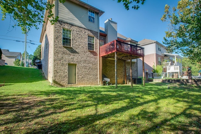 5409 Oak Chase Dr, Antioch, TN 37013 - back of property featuring brick siding, a yard, and a deck