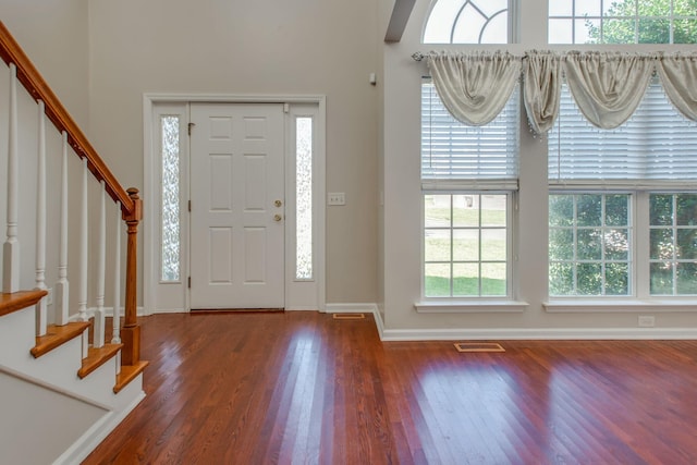 5409 Oak Chase Dr, Antioch, TN 37013 - entryway featuring wood finished floors, baseboards, and stairway