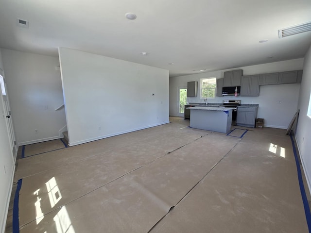 2378 Nelson Way, Cookeville, TN 38506 - living room with baseboards, stairs, and concrete floors