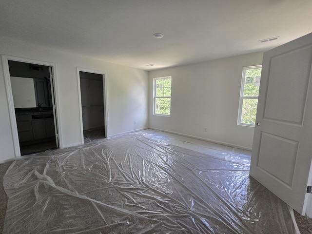 2378 Nelson Way, Cookeville, TN 38506 - unfurnished bedroom featuring baseboards and a spacious closet