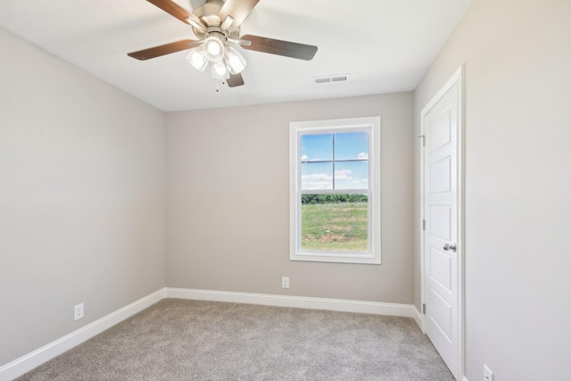 837 Macon Ln, Clarksville, TN 37042 - spare room featuring light colored carpet, baseboards, and ceiling fan