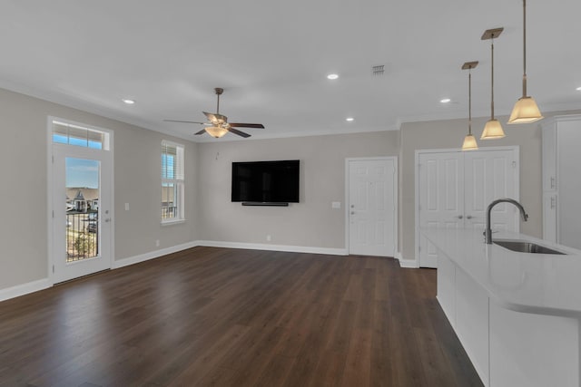 3115 Patcham Dr # 201, Nolensville, TN 37135 - unfurnished living room featuring a sink, ornamental molding, dark wood-type flooring, ceiling fan, and recessed lighting