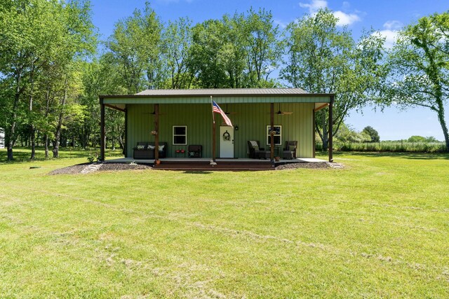 1408 Baker Ln, Lawrenceburg, TN 38464 - rear view of house with a lawn and ceiling fan