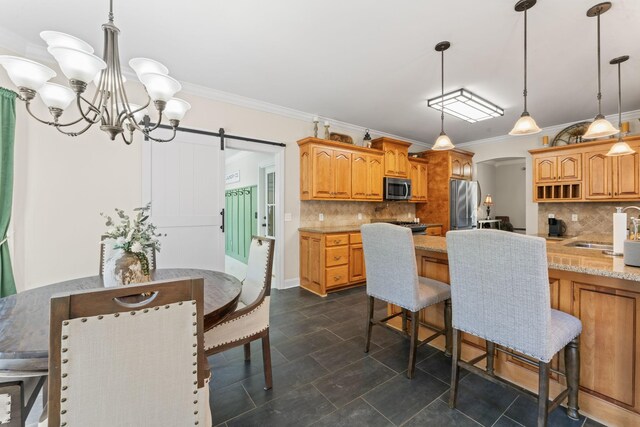 1408 Baker Ln, Lawrenceburg, TN 38464 - kitchen with appliances with stainless steel finishes, a chandelier, a sink, decorative backsplash, and crown molding