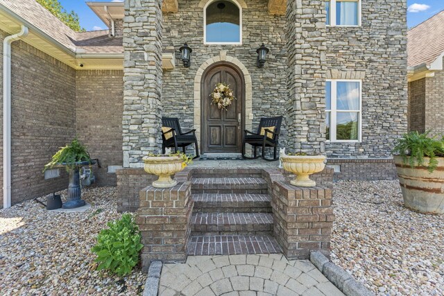 1408 Baker Ln, Lawrenceburg, TN 38464 - entrance to property with stone siding and a shingled roof