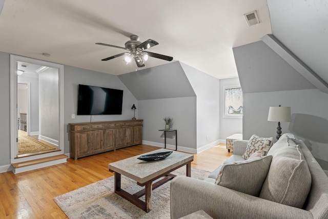 1408 Baker Ln, Lawrenceburg, TN 38464 - living area featuring baseboards, light wood-style floors, a ceiling fan, and vaulted ceiling