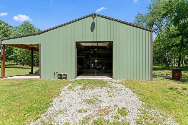 1408 Baker Ln, Lawrenceburg, TN 38464 - view of pole building featuring a yard and driveway