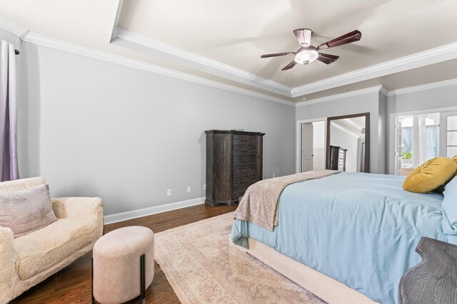 1408 Baker Ln, Lawrenceburg, TN 38464 - bedroom with a raised ceiling, baseboards, dark wood-style floors, crown molding, and ceiling fan