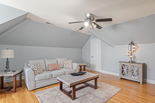 1408 Baker Ln, Lawrenceburg, TN 38464 - living area featuring a ceiling fan, wood finished floors, vaulted ceiling, and baseboards