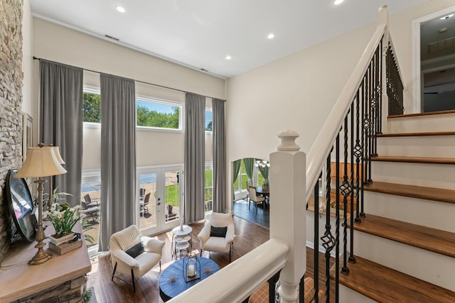 1408 Baker Ln, Lawrenceburg, TN 38464 - living room featuring wood finished floors, recessed lighting, stairway, french doors, and a towering ceiling