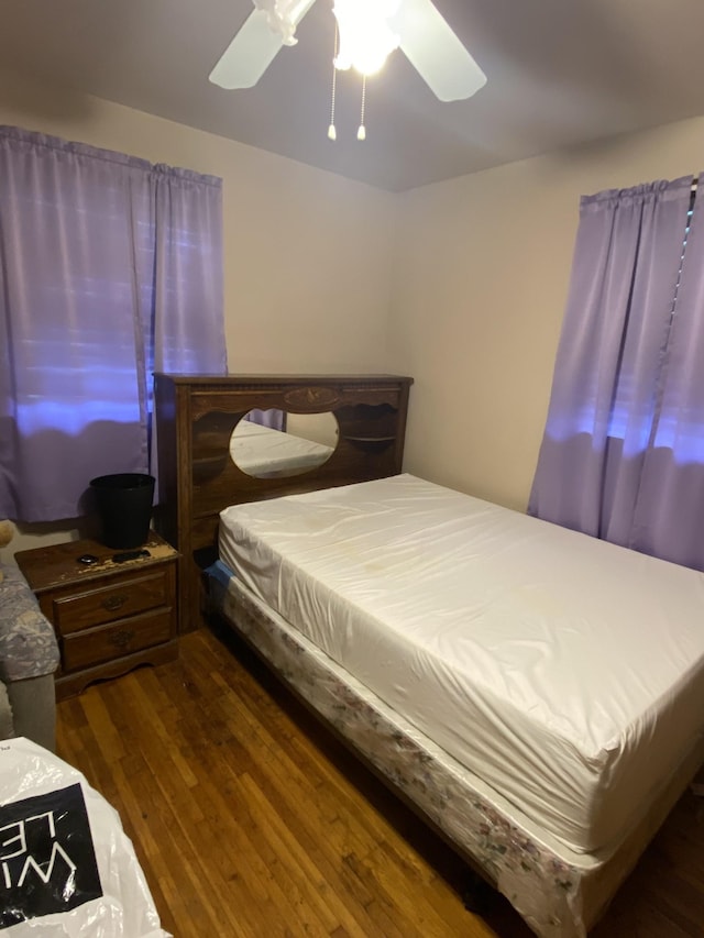 915 Wedgewood Ave, Nashville, TN 37203 - bedroom with dark wood-type flooring and ceiling fan