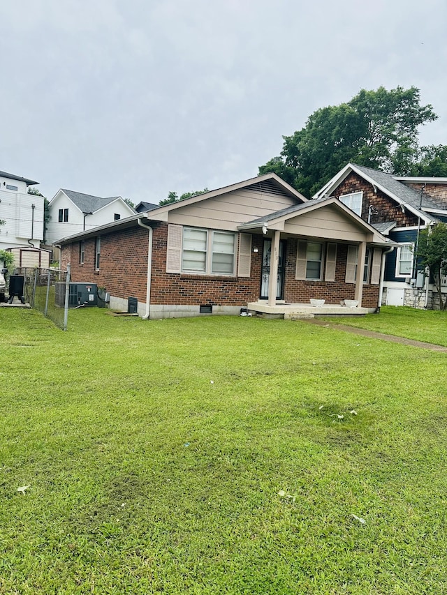 915 Wedgewood Ave, Nashville, TN 37203 - view of front of home with brick siding and covered porch