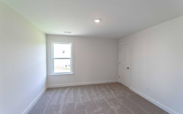 198 John T Alexander Blvd, Hendersonville, TN 37075 - empty room with baseboards and light carpet