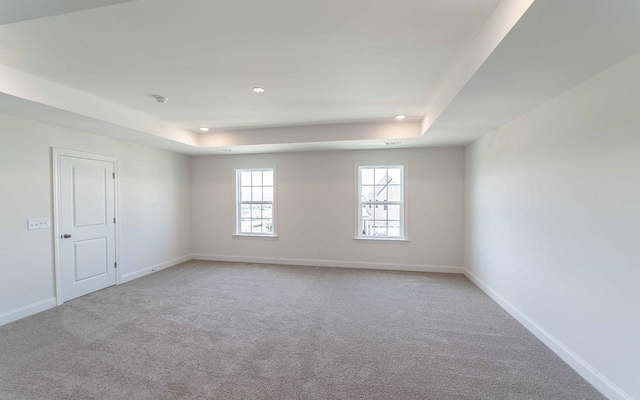 198 John T Alexander Blvd, Hendersonville, TN 37075 - empty room with a raised ceiling, carpet flooring, recessed lighting, baseboards, and a smoke detector