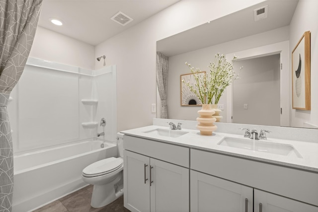 7212 Hanworth St, Fairview, TN 37062 - full bath with double vanity, toilet, shower / tub combo, tile patterned floors, and recessed lighting