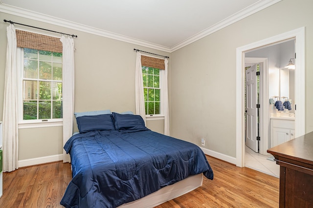 256 Scenic Dr, Dickson, TN 37055 - bedroom with crown molding, baseboards, and light wood-style flooring