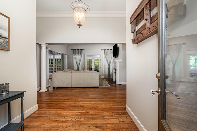 256 Scenic Dr, Dickson, TN 37055 - hall with crown molding, wood finished floors, decorative columns, and baseboards