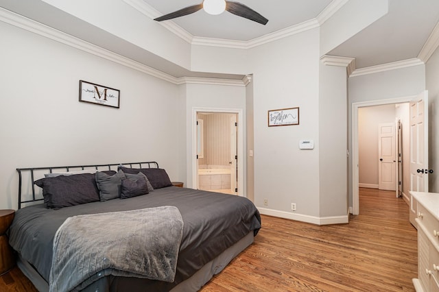 256 Scenic Dr, Dickson, TN 37055 - bedroom with ornamental molding, light wood-style floors, baseboards, ensuite bath, and a ceiling fan