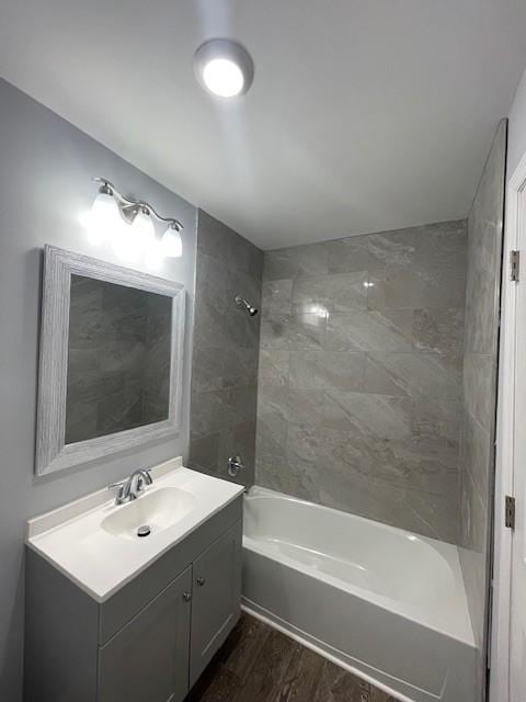 4805 Buena Vista Pike, Nashville, TN 37218 - full bathroom featuring vanity,  shower combination, and wood finished floors