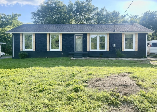 4805 Buena Vista Pike, Nashville, TN 37218 - ranch-style house with a front lawn, roof with shingles, and brick siding