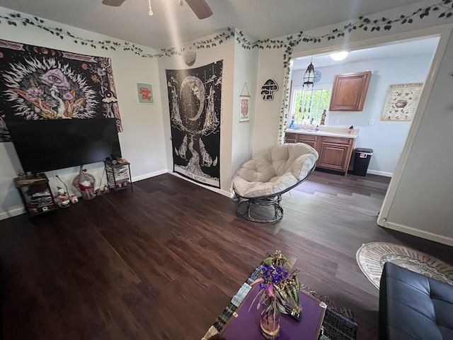 962 3rd St, Tracy City, TN 37387 - living area featuring a ceiling fan, baseboards, and dark wood-style flooring