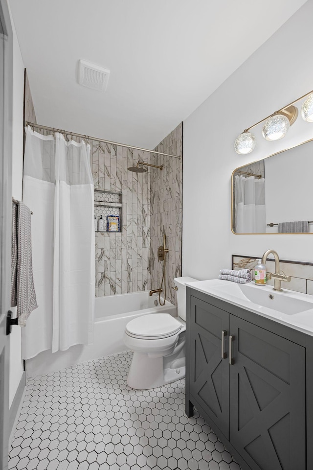 1607 Riverside Dr, Nashville, TN 37216 - full bath with vanity, toilet, shower / bath combo, and tile patterned floors
