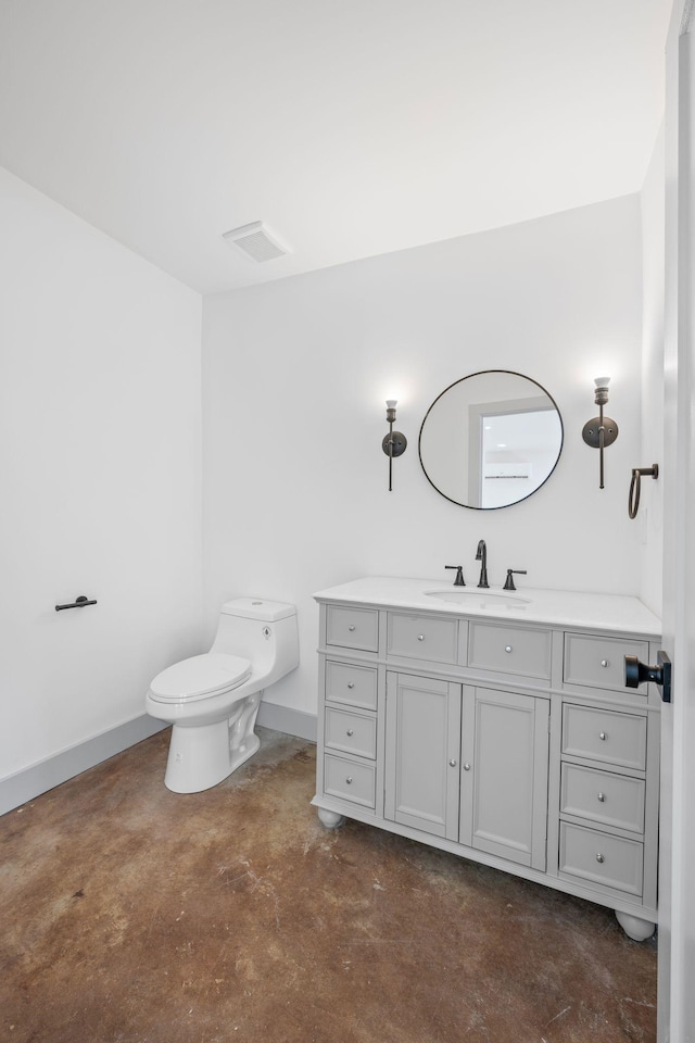 1607 Riverside Dr, Nashville, TN 37216 - bathroom with finished concrete flooring, vanity, toilet, and baseboards