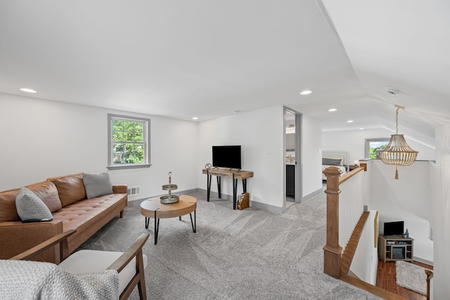 1607 Riverside Dr, Nashville, TN 37216 - living room with healthy amount of natural light, light carpet, recessed lighting, baseboards, and lofted ceiling