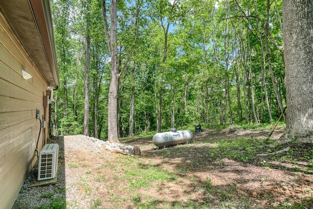 3269 Moodyville Rd, Byrdstown, TN 38549 - view of yard with ac unit and a forest view