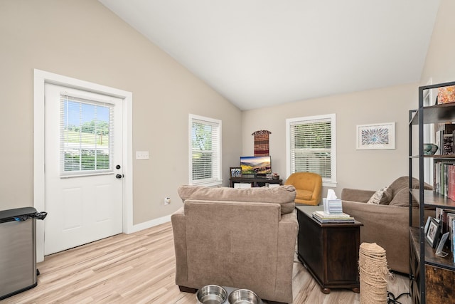 3269 Moodyville Rd, Byrdstown, TN 38549 - living area featuring lofted ceiling, light wood-style floors, and baseboards