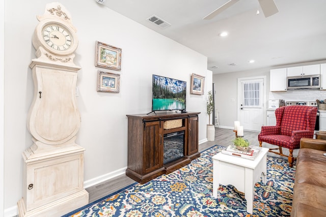 107 Beech St, Columbia, TN 38401 - living room featuring baseboards, wood finished floors, ceiling fan, recessed lighting, and a fireplace