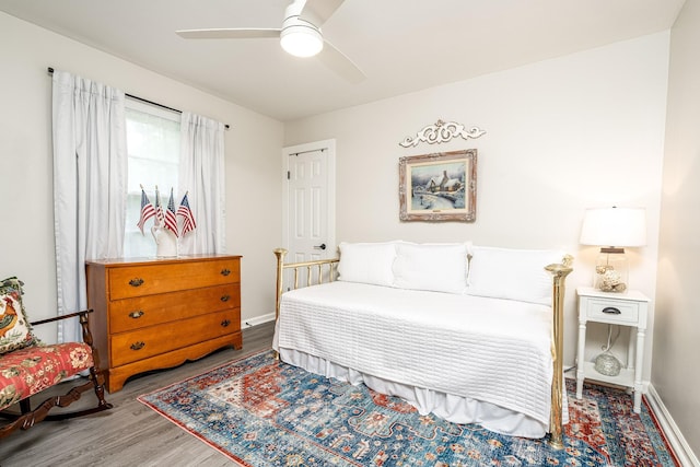 107 Beech St, Columbia, TN 38401 - bedroom with wood finished floors, baseboards, and ceiling fan