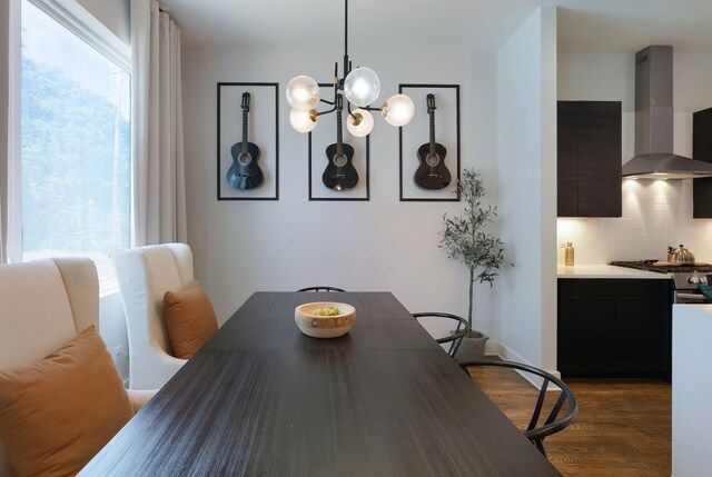 2910 Felicia St Unit 19, Nashville, TN 37209 - dining area featuring dark wood finished floors, plenty of natural light, and a chandelier