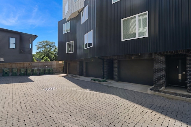 2910 Felicia St Unit 19, Nashville, TN 37209 - view of building exterior featuring a garage and driveway