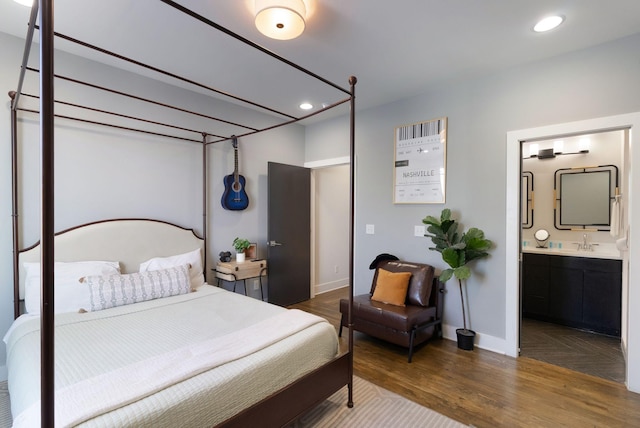 2910 Felicia St Unit 19, Nashville, TN 37209 - bedroom featuring a sink, recessed lighting, wood finished floors, baseboards, and connected bathroom