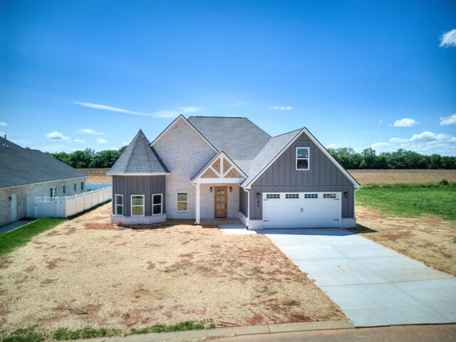 296 Lookout Dr, Winchester, TN 37398 - view of front of property featuring board and batten siding, concrete driveway, and a garage