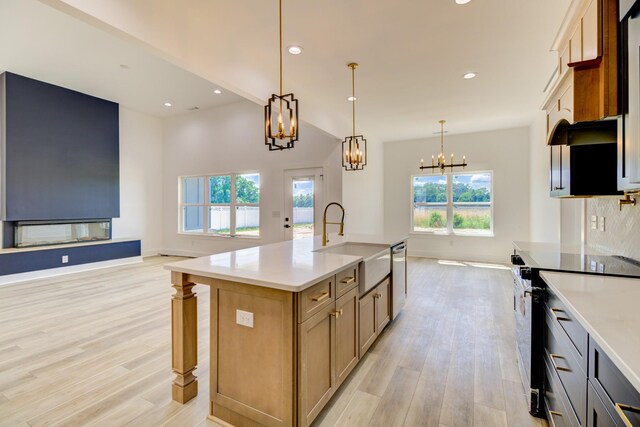 296 Lookout Dr, Winchester, TN 37398 - kitchen featuring range with electric cooktop, a sink, light wood-type flooring, healthy amount of natural light, and recessed lighting