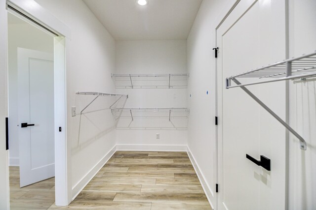 296 Lookout Dr, Winchester, TN 37398 - spacious closet featuring light wood finished floors