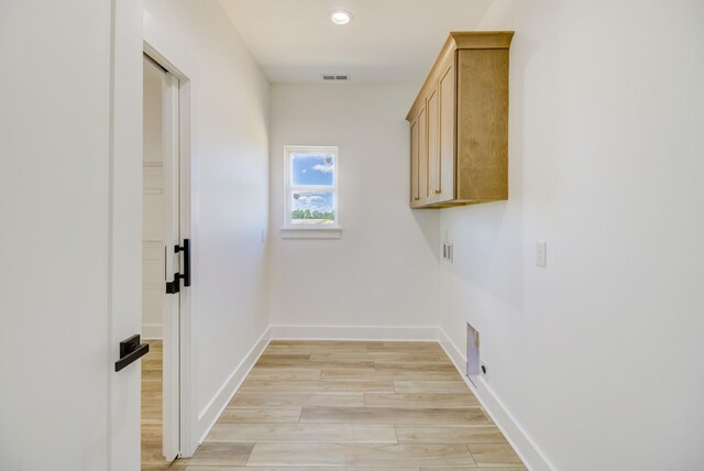 296 Lookout Dr, Winchester, TN 37398 - laundry room featuring cabinet space, hookup for an electric dryer, recessed lighting, baseboards, and washer hookup
