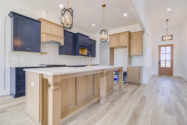 296 Lookout Dr, Winchester, TN 37398 - kitchen with a chandelier, tasteful backsplash, light wood finished floors, light countertops, and recessed lighting