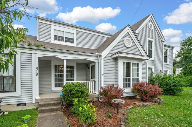 919 Rachels Pl, Hermitage, TN 37076 - view of front of house with a porch, a front yard, and roof with shingles