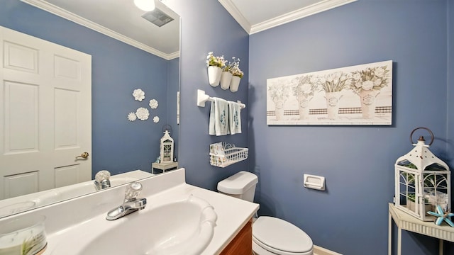 2458 Carrollwood Ln, Cordova, TN 38016 - half bathroom featuring vanity, toilet, ornamental molding, and baseboards