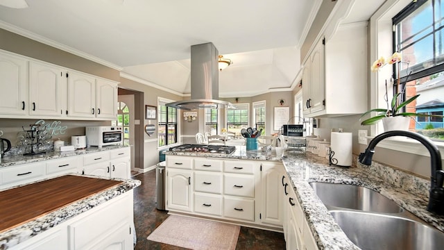 2458 Carrollwood Ln, Cordova, TN 38016 - kitchen with island range hood, a sink, stainless steel gas cooktop, white microwave, and white cabinets