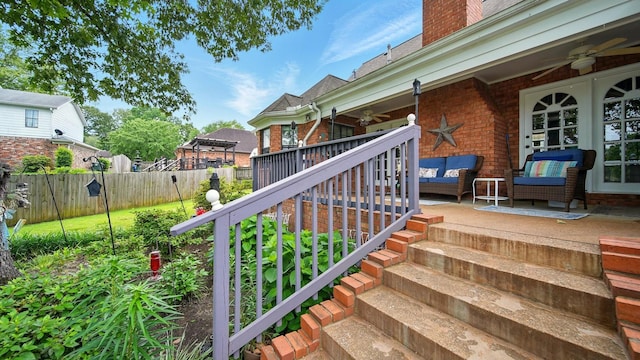2458 Carrollwood Ln, Cordova, TN 38016 - wooden deck featuring ceiling fan, stairway, and an outdoor living space