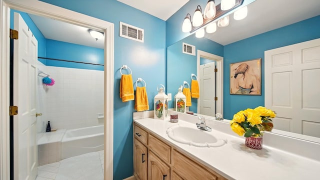 2458 Carrollwood Ln, Cordova, TN 38016 - full bathroom featuring vanity, tile patterned flooring, and shower / washtub combination