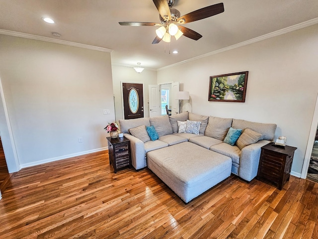 300 Woodson Dr, Tullahoma, TN 37388 - living area with wood finished floors, ceiling fan, ornamental molding, baseboards, and recessed lighting