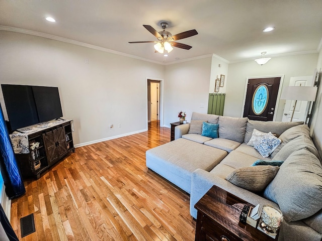 300 Woodson Dr, Tullahoma, TN 37388 - living room with light wood finished floors, ceiling fan, baseboards, ornamental molding, and recessed lighting