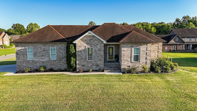 300 Woodson Dr, Tullahoma, TN 37388 - view of front of property with a front lawn and brick siding